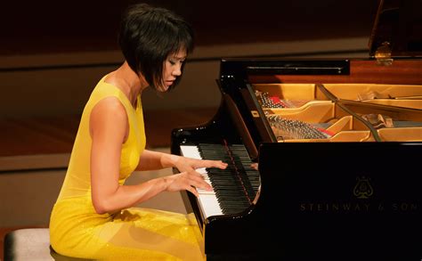 Yuja wang - Yuja Wang was born in Beijing in February 1987 and was encouraged at a young age to make music by her dancer mother and percussionist father. She is an internationally recognized concert pianist and has a record contract with Deutsche Grammophon. View more.
